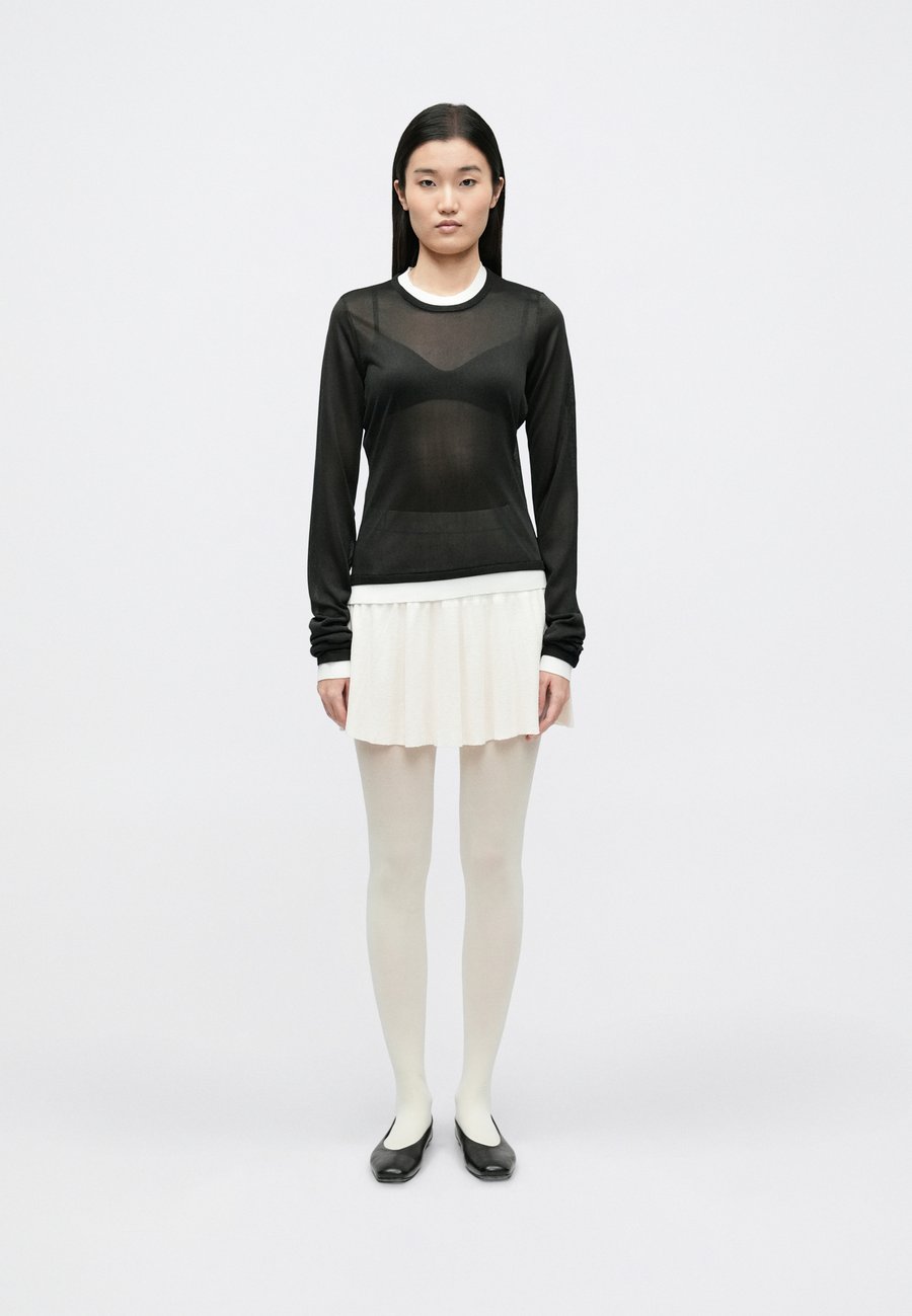 Джемпер A. Roege Hove ANAIS DOUBLE LONG SLEEVE, Black/White/Black
Джемпер A. Roege Hove ANAIS DOUBLE LONG SLEEVE, Black/White/Black