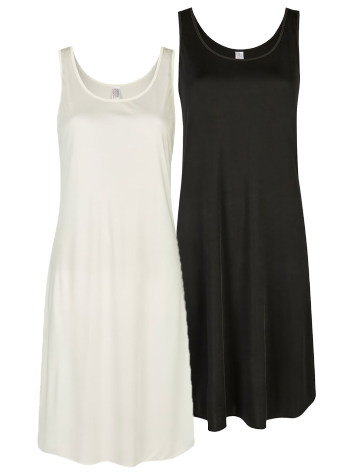 Nina von C. Комплект из двух платьев-комбинаций, длина 90 см, цвет шампанское-черный
Nina von C. Комплект из двух платьев-комбинаций, длина 90 см, цвет шампанское-черный