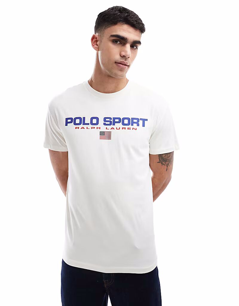 Футболка Polo Ralph Lauren Sport Capsule с большим нагрудным флагом и логотипом, классического свободного кроя, кремового цвета
Футболка Polo Ralph Lauren Sport Capsule с большим нагрудным флагом и логотипом, классического свободного кроя, кремового цвета