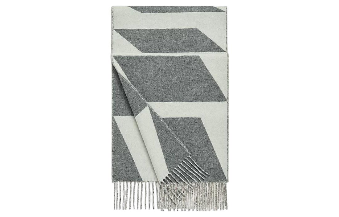 Шерстяной шарф HERMES цвета слоновой кости и средне-серого
Шерстяной шарф HERMES цвета слоновой кости и средне-серого