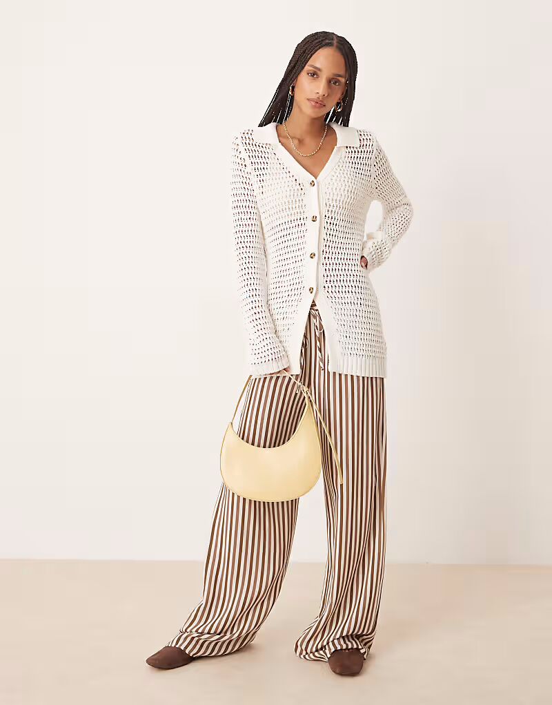 Кардиган с разрезом спереди и открытым швом ASOS DESIGN кремового цвета
Кардиган с разрезом спереди и открытым швом ASOS DESIGN кремового цвета