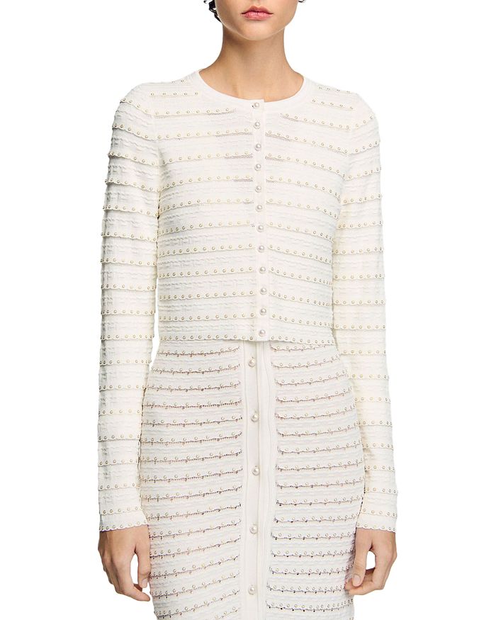 Короткий кардиган Sandro, слоновая кость/кремовый
Короткий кардиган Sandro, слоновая кость/кремовый