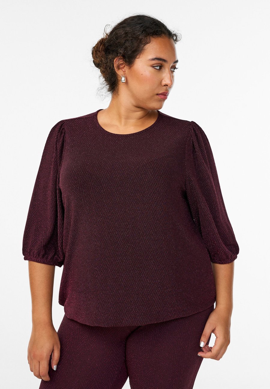 Блуза Zizzi MIT GLITZERMUSTER UND 3/4-ÄRMELN, Fudge W Fudge L/Bordeaux
Блуза Zizzi MIT GLITZERMUSTER UND 3/4-ÄRMELN, Fudge W Fudge L/Bordeaux