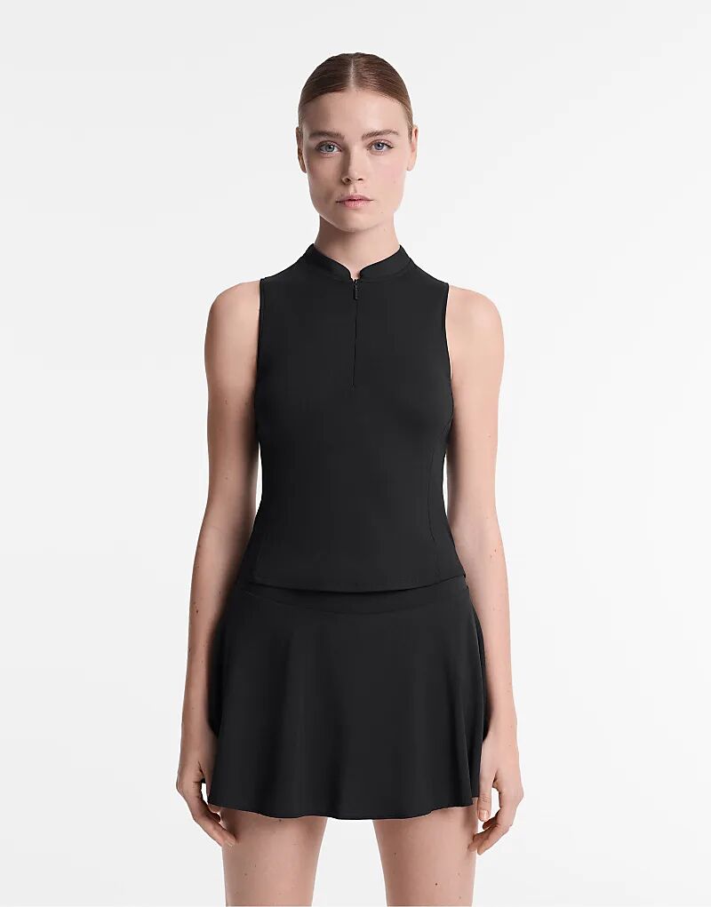 Футболка без рукавов на молнии Oysho черного цвета 
Футболка без рукавов на молнии Oysho черного цвета