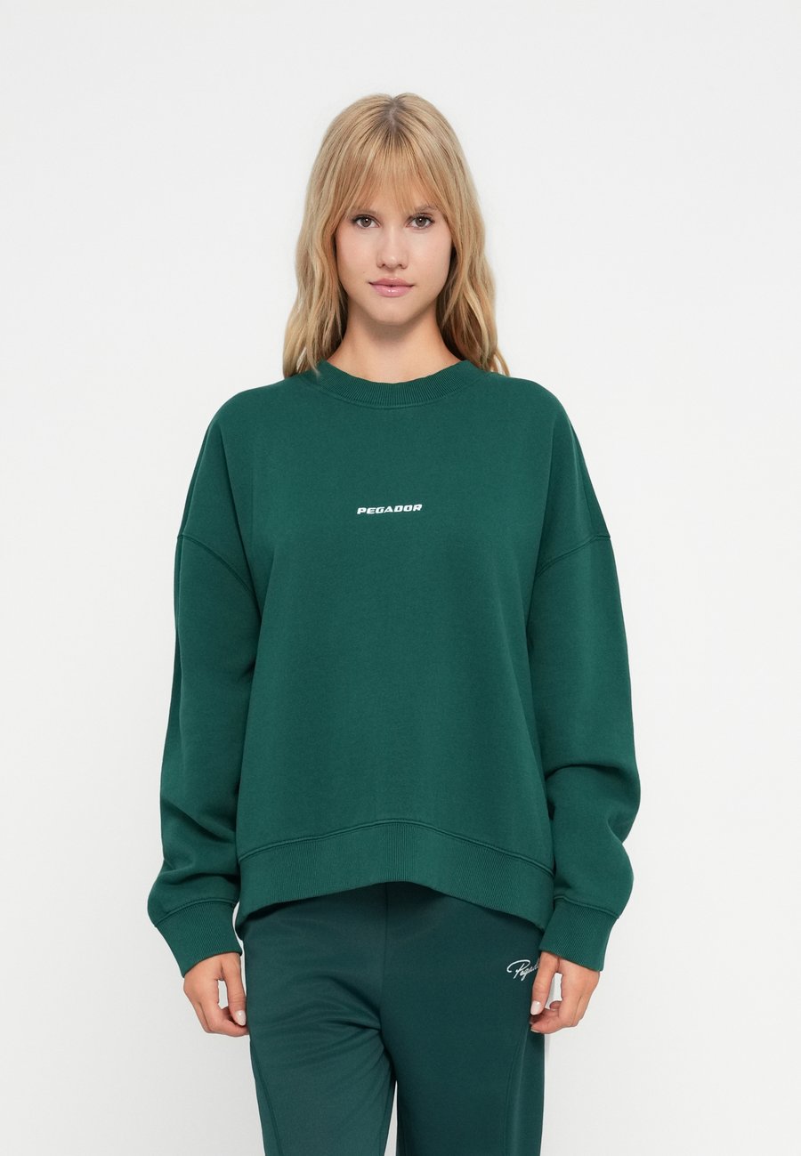 Толстовка Pegador SELA, Washed Dark Green/White/Dark Green
Толстовка Pegador SELA, Washed Dark Green/White/Dark Green