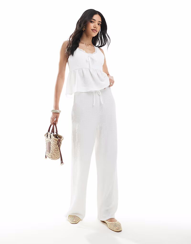 Брюки прямого кроя из текстурированного джерси Miss Selfridge цвета экрю
Брюки прямого кроя из текстурированного джерси Miss Selfridge цвета экрю