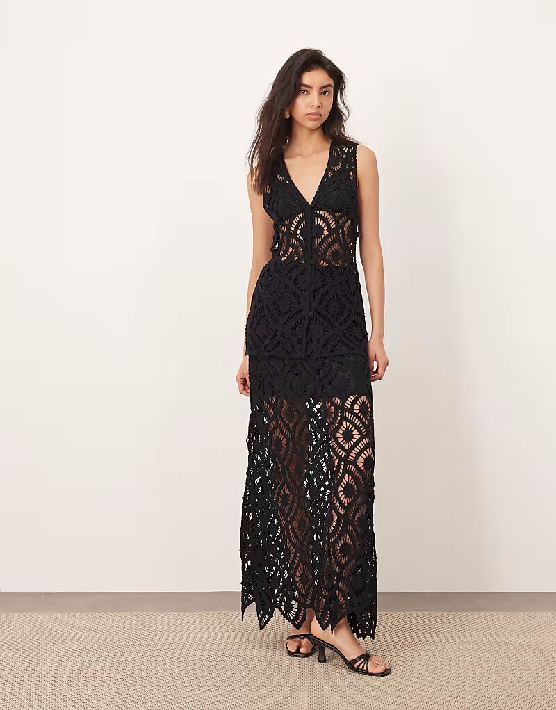 Длинная юбка-трапеция крючком в черном цвете Arrange
Длинная юбка-трапеция крючком в черном цвете Arrange