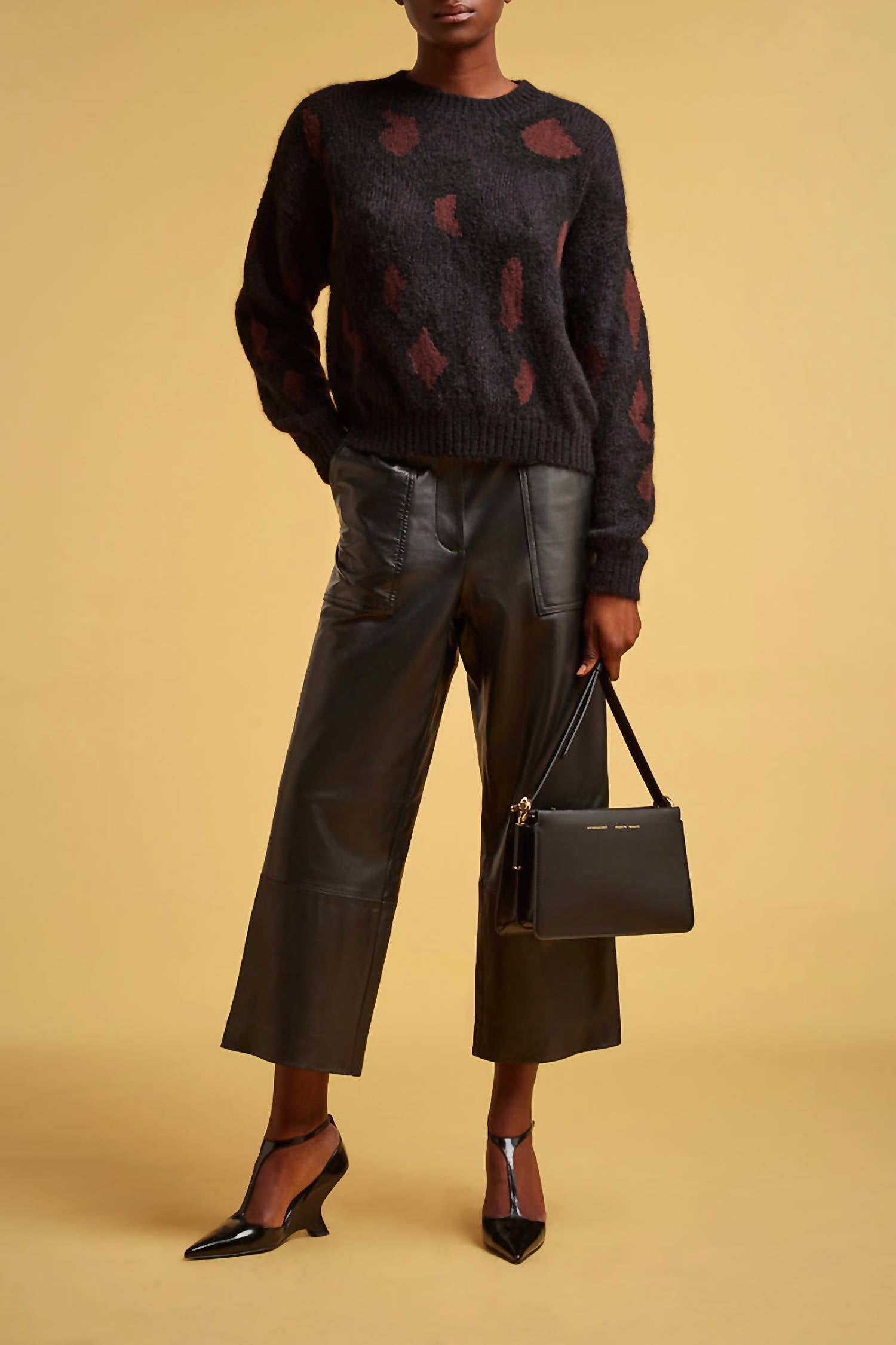 Свитер из смесовой шерсти черного/коричневого цвета Liviana Conte
Свитер из смесовой шерсти черного/коричневого цвета Liviana Conte