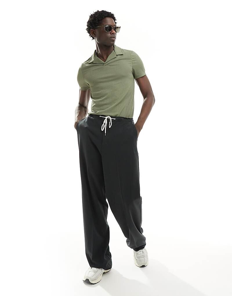 Рубашка-поло цвета хаки с фактурной ребристостью ASOS DESIGN
Рубашка-поло цвета хаки с фактурной ребристостью ASOS DESIGN