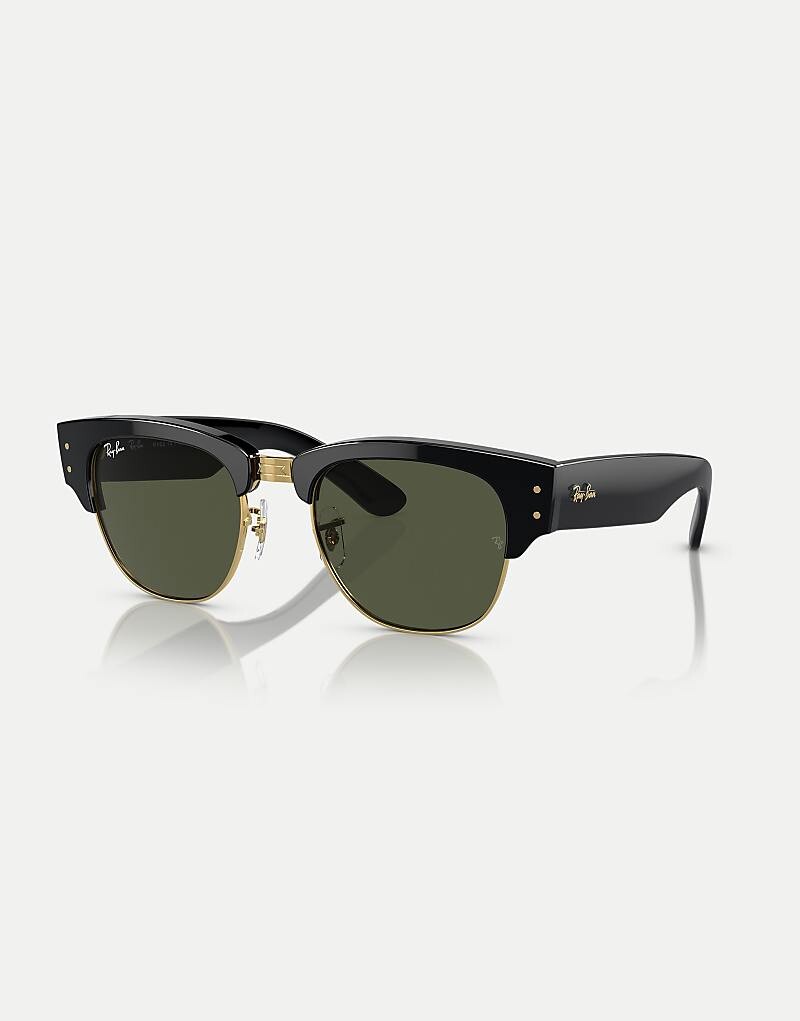 Солнцезащитные очки Ray-Ban Clubmaster черного и золотого цвета с зелеными линзами
Солнцезащитные очки Ray-Ban Clubmaster черного и золотого цвета с зелеными линзами