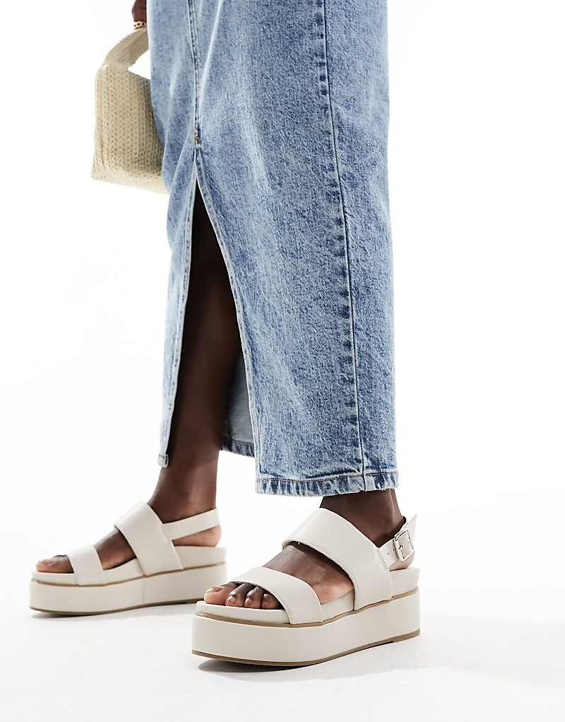 ASOS DESIGN – Tucker 2 – Белые сандалии на плоской подошве с массивной подошвой на платформеs
ASOS DESIGN – Tucker 2 – Белые сандалии на плоской подошве с массивной подошвой на платформеs