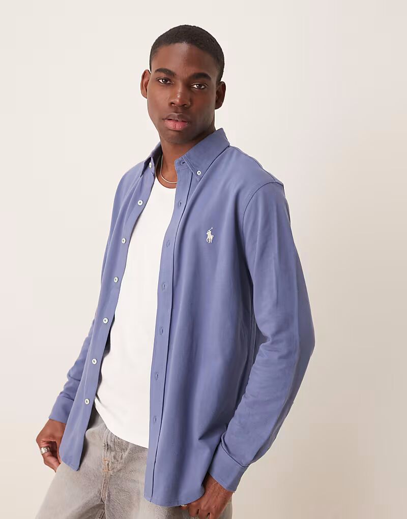 Рубашка из пике с логотипом Polo Ralph Lauren, средне-синего цвета
Рубашка из пике с логотипом Polo Ralph Lauren, средне-синего цвета