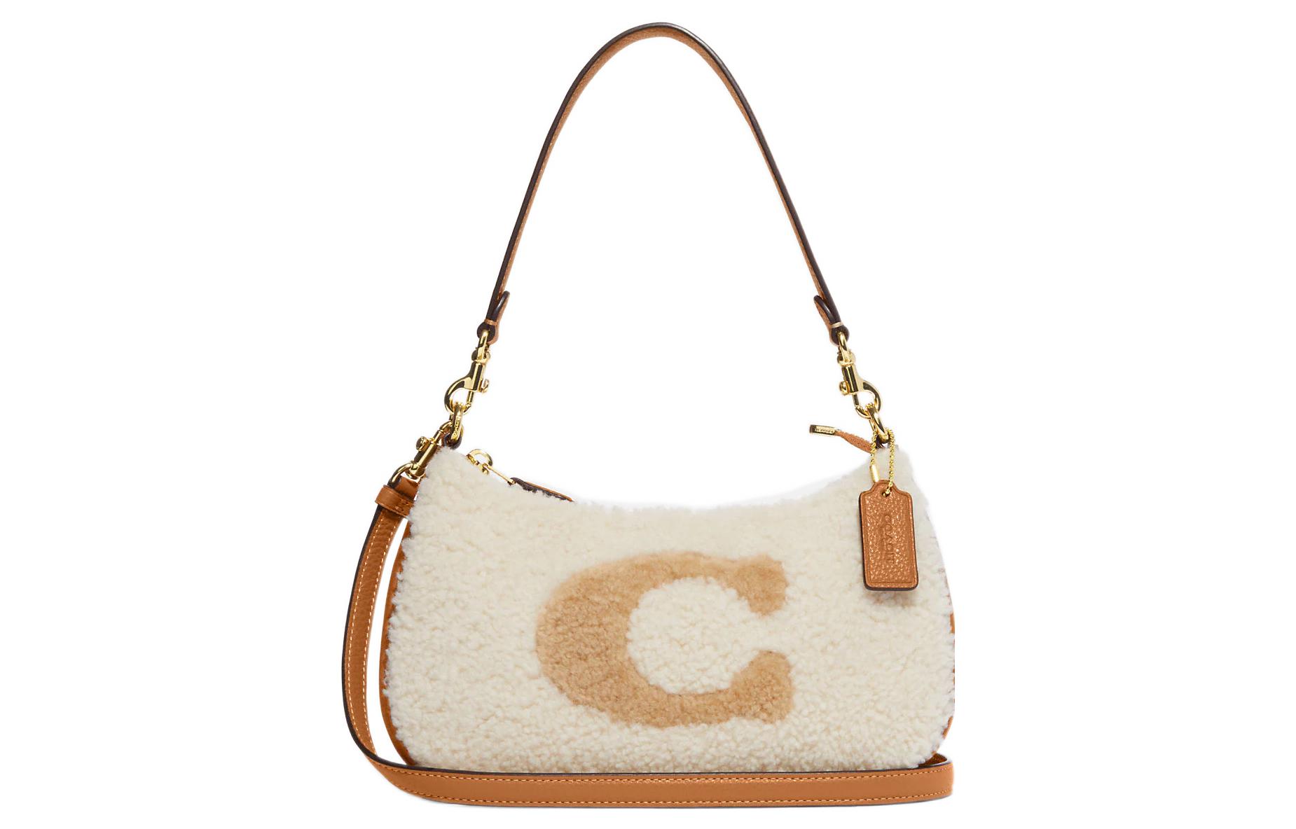 Женская сумка Teri 24 через плечо COACH
Женская сумка Teri 24 через плечо COACH