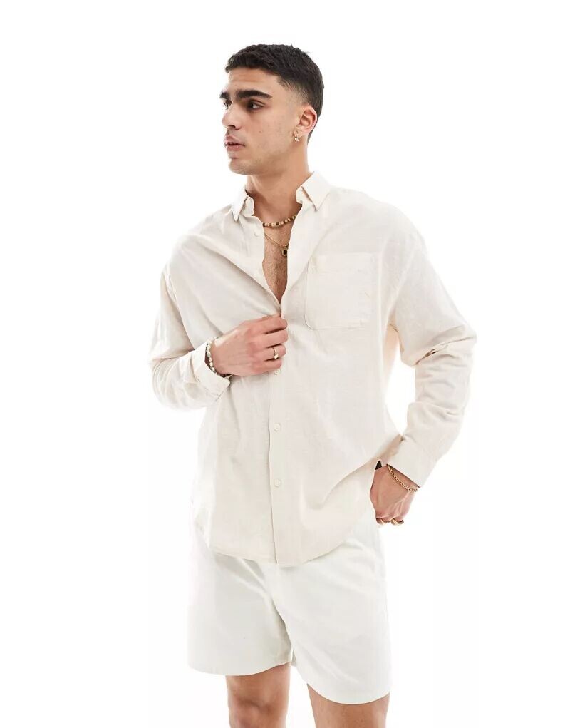 Бежевая льняная рубашка оверсайз в стиле 90-х ASOS
Бежевая льняная рубашка оверсайз в стиле 90-х ASOS