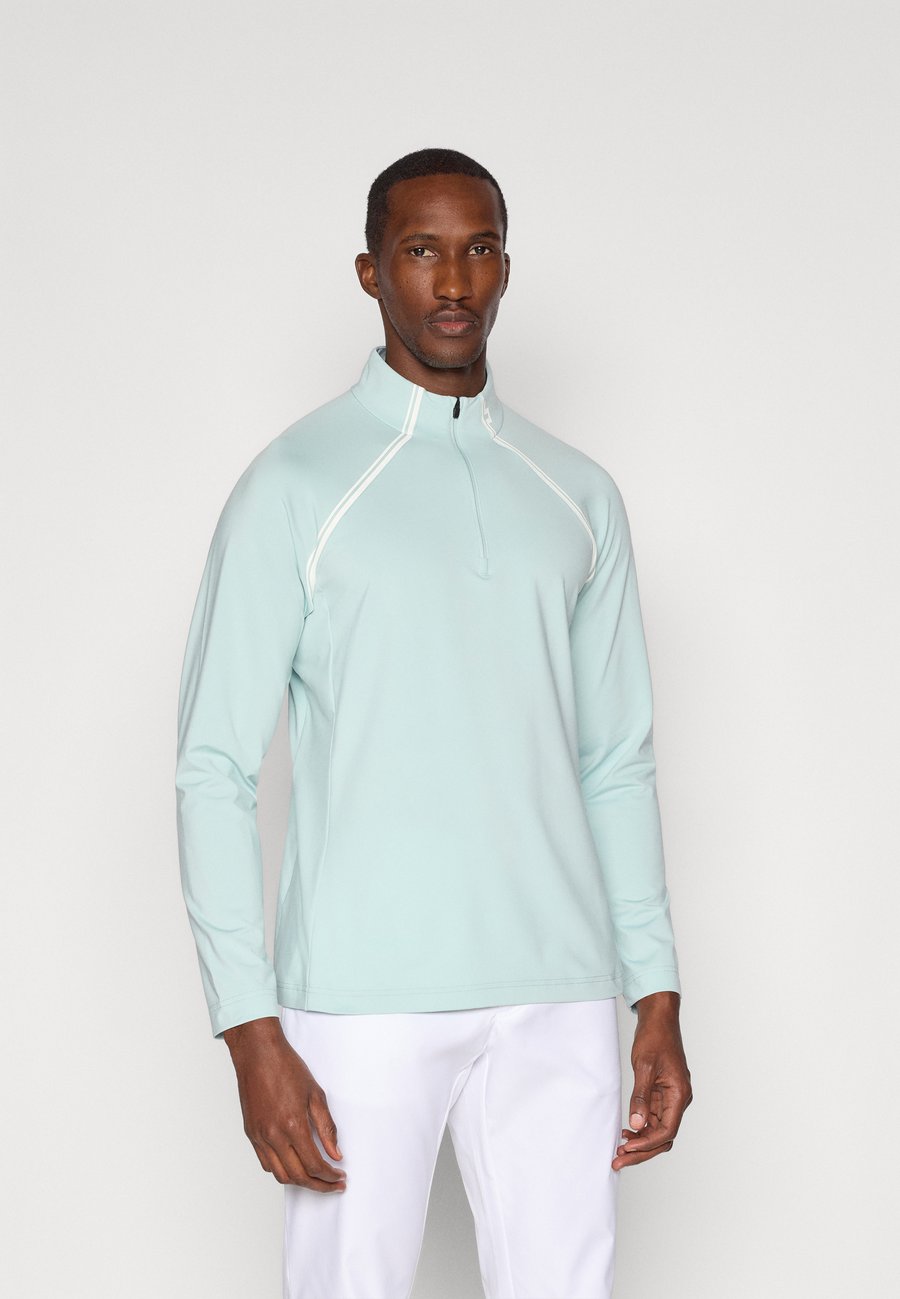 Топ J.LINDEBERG Sports PLAYERS MID LAYER, Blue Haze/Blue
Топ J.LINDEBERG Sports PLAYERS MID LAYER, Blue Haze/Blue