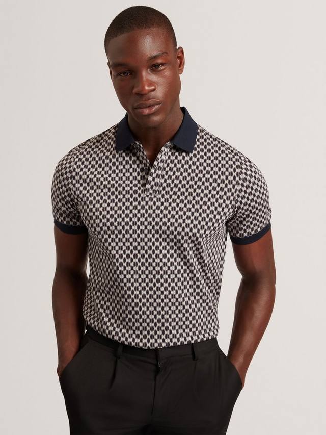 Хлопковая поло с геометрическим принтом и короткими рукавами от Ernist Ted Baker
Хлопковая поло с геометрическим принтом и короткими рукавами от Ernist Ted Baker