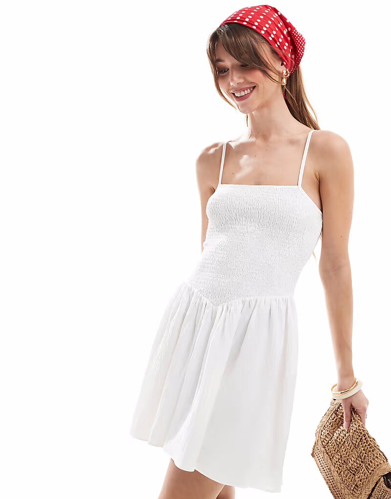 Эксклюзивное мини-платье Frolic с квадратным вырезом, заниженной талией и сборками белого цвета
Эксклюзивное мини-платье Frolic с квадратным вырезом, заниженной талией и сборками белого цвета