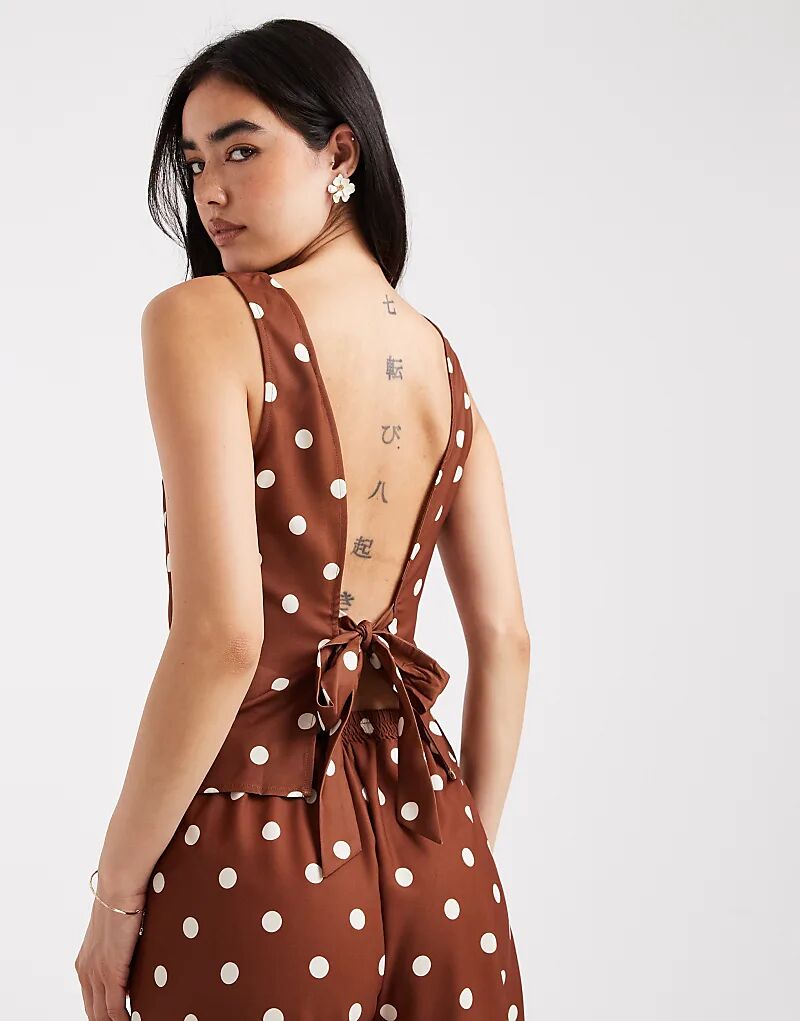 Топ без рукавов Vero Moda с завязками на спине в горошек
Топ без рукавов Vero Moda с завязками на спине в горошек