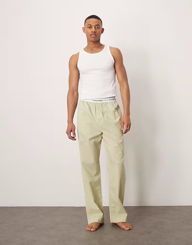 Пижамные штаны Calvin Klein из хлопка зеленого цвета с выцветшим монограммным принтом
Пижамные штаны Calvin Klein из хлопка зеленого цвета с выцветшим монограммным принтом