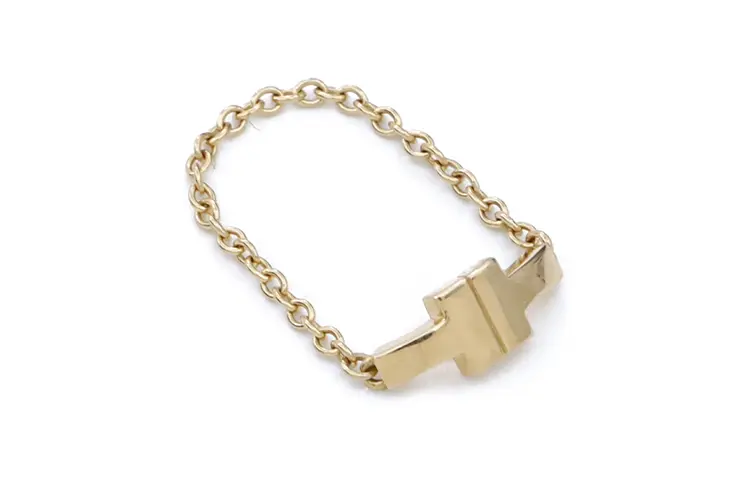 TIFFANY & CO. Кольцо-цепочка из желтого золота 18 карат T
TIFFANY & CO. Кольцо-цепочка из желтого золота 18 карат T