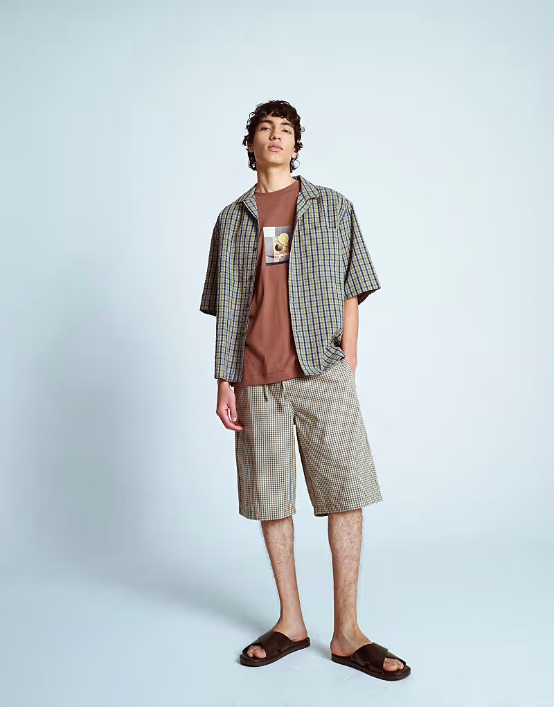 Зеленые марлевые шорты в клетку jort Topman
Зеленые марлевые шорты в клетку jort Topman