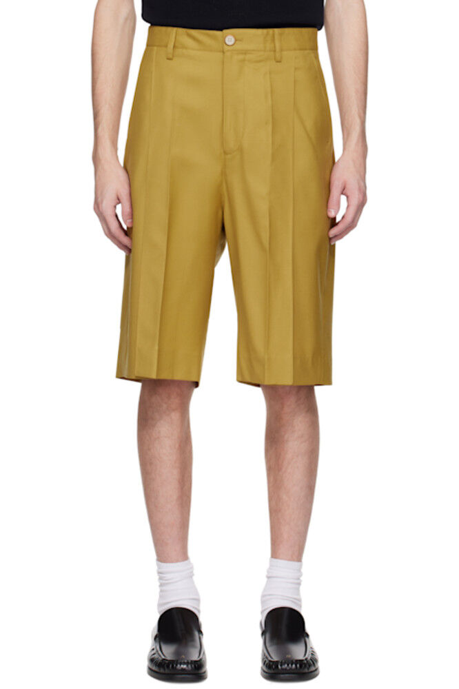 Желтые шорты Ara с глубокими складками CMMN SWDN
Желтые шорты Ara с глубокими складками CMMN SWDN