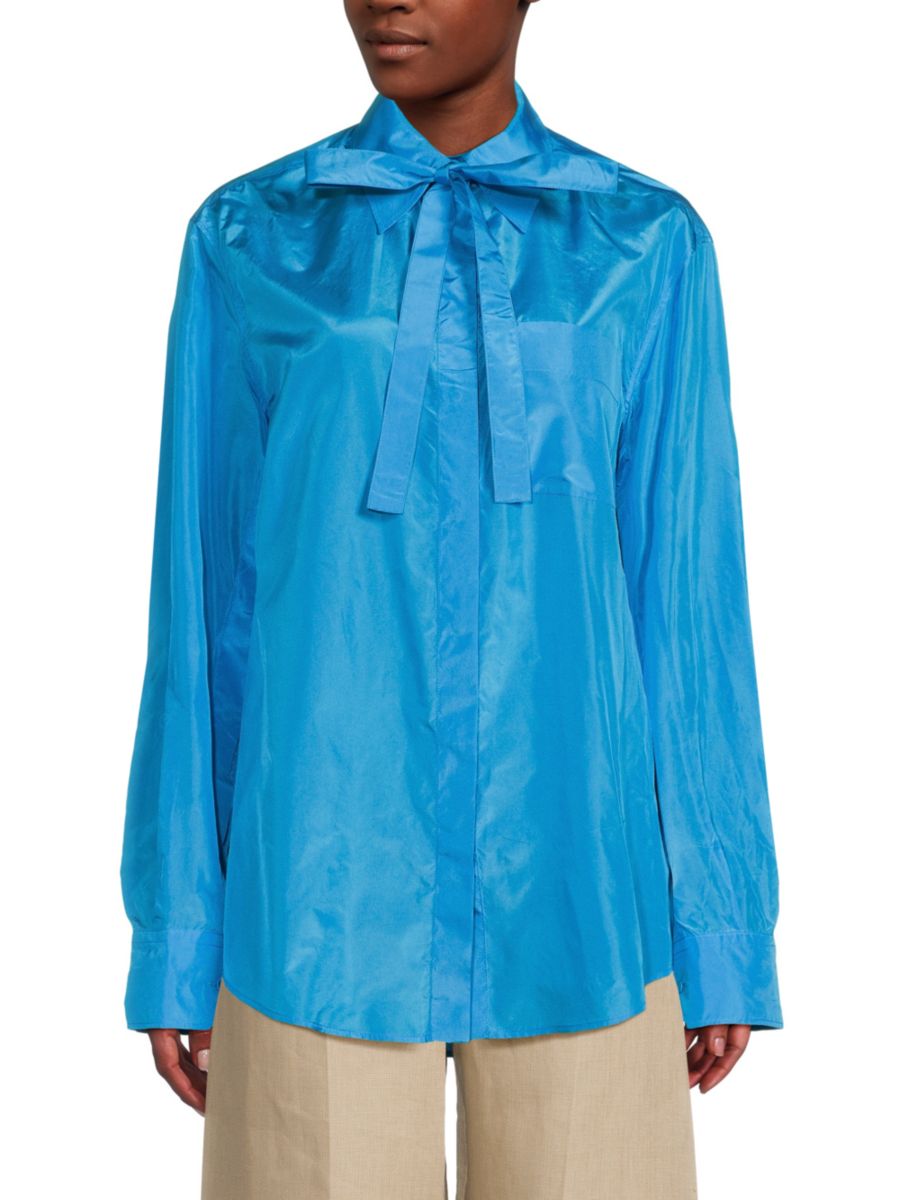 Шелковая рубашка с бантом Valentino, цвет Supersonic Blue
Шелковая рубашка с бантом Valentino, цвет Supersonic Blue
