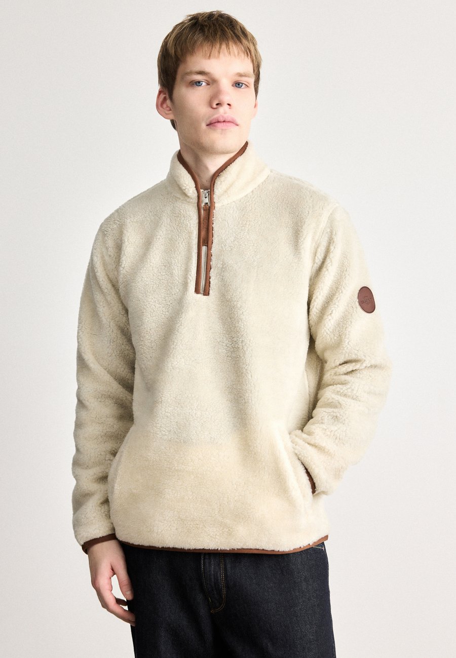 Джемпер GANT HALF ZIP , Cream/Off-White
Джемпер GANT HALF ZIP , Cream/Off-White
