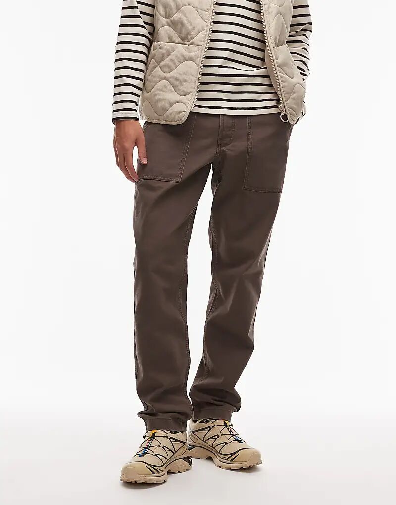 Брюки свободного кроя Timberland из плотной парусины с потертостями и карманами темно-коричневого цвета
Брюки свободного кроя Timberland из плотной парусины с потертостями и карманами темно-коричневого цвета