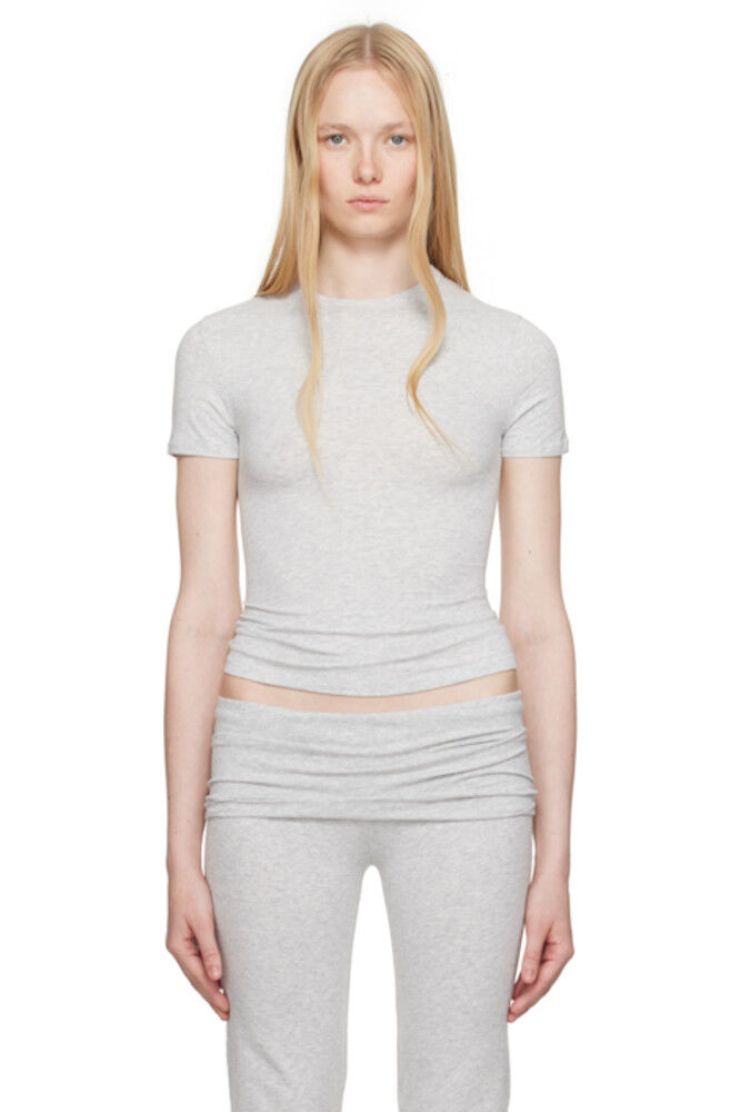 Футболка из серого хлопкового джерси SKIMS
Футболка из серого хлопкового джерси SKIMS