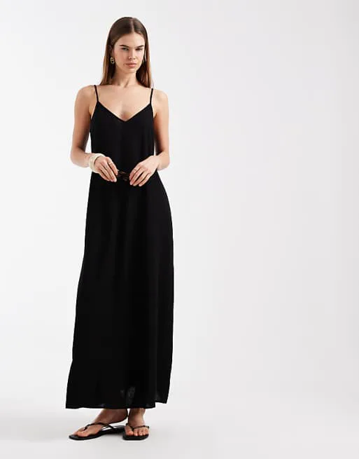 Черное льняное платье макси на бретельках Vero Moda
Черное льняное платье макси на бретельках Vero Moda