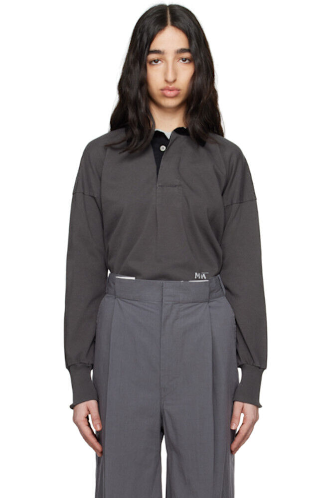 Серый Поло с напечатанным логотипом Maison Margiela
Серый Поло с напечатанным логотипом Maison Margiela