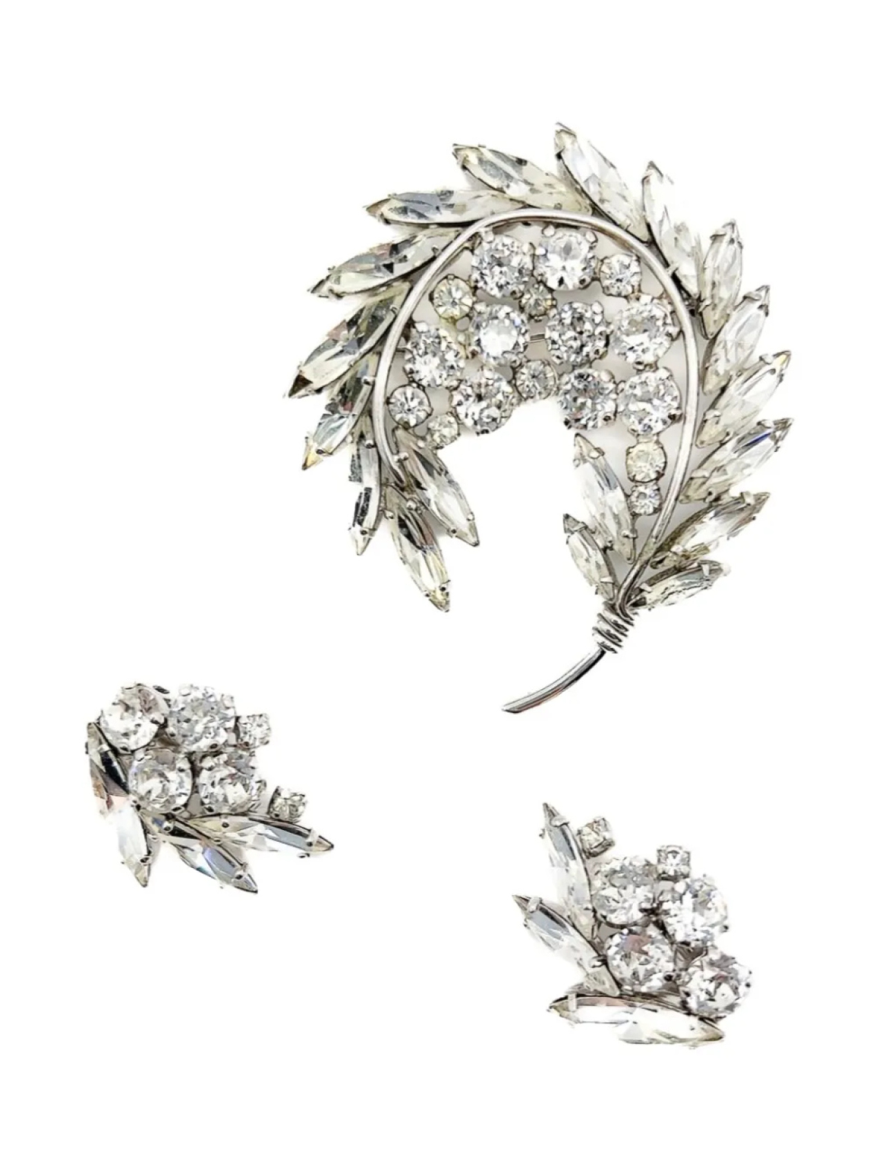 Jennifer Gibson Jewellery комплект из броши и серег Sherman Floral Navette (1950-е годы), серебряный
Jennifer Gibson Jewellery комплект из броши и серег Sherman Floral Navette (1950-е годы), серебряный