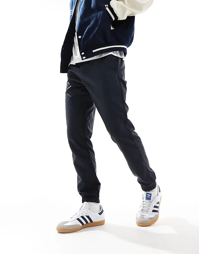 Брюки French Connection Utility Tech с манжетами темно-синего цвета
Брюки French Connection Utility Tech с манжетами темно-синего цвета