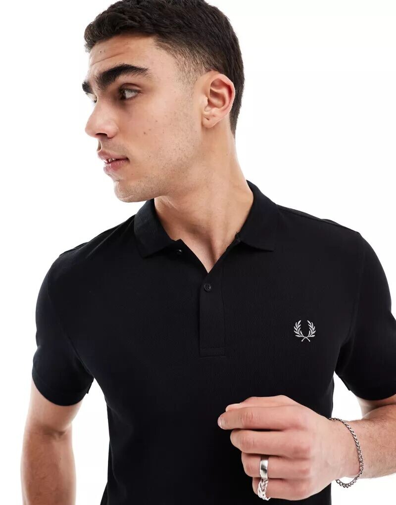 Черная однотонная рубашка-поло Fred Perry
Черная однотонная рубашка-поло Fred Perry