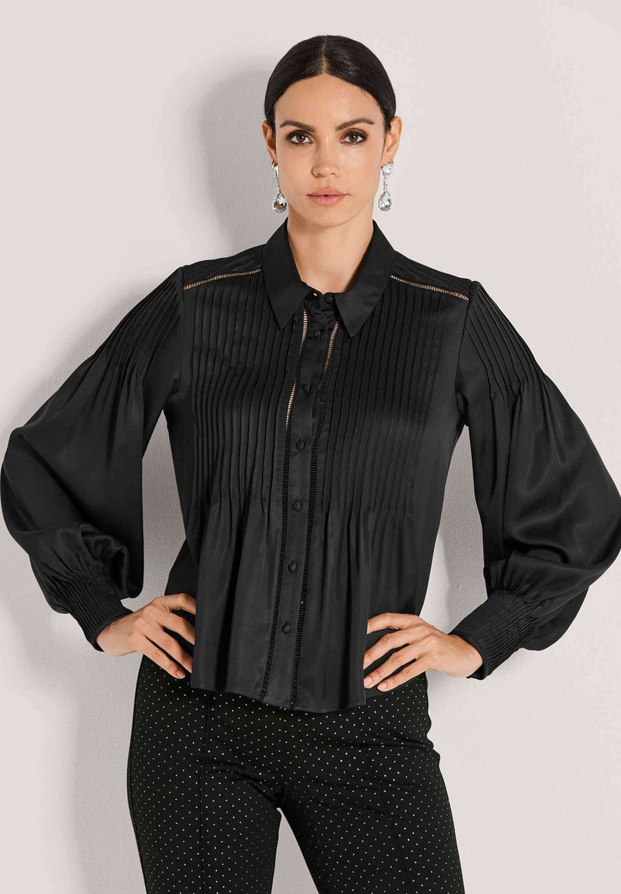 Блуза MADELEINE Button-down blouse, Black
Блуза MADELEINE Button-down blouse, Black