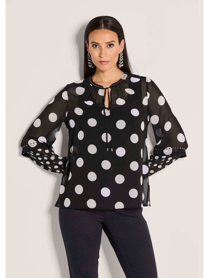 MADELEINE Элегантная блузка в горошек черно-белого цвета
MADELEINE Элегантная блузка в горошек черно-белого цвета