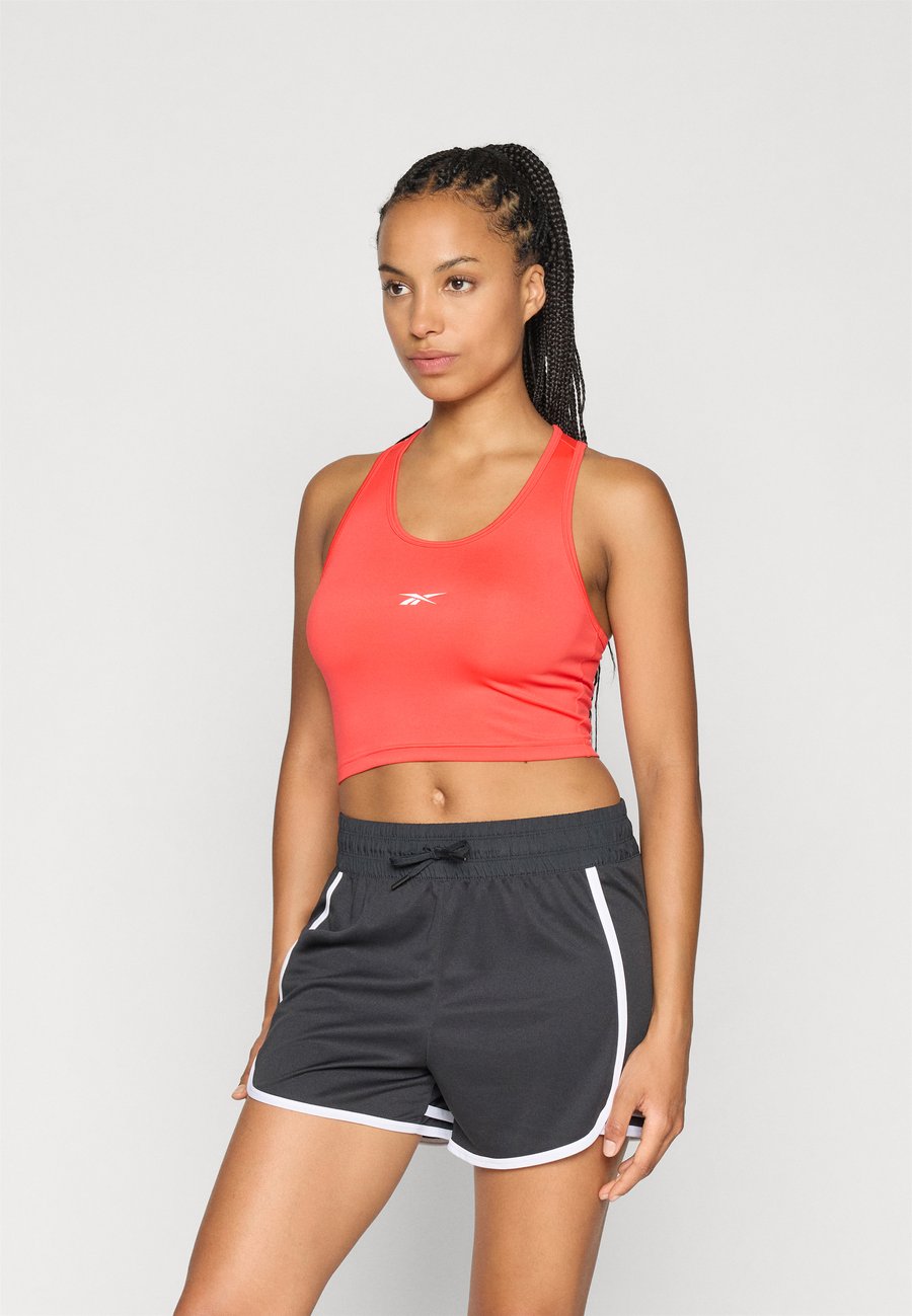 Топ Reebok TRAIN CROPPED TANK, Energy Red/Red
Топ Reebok TRAIN CROPPED TANK, Energy Red/Red