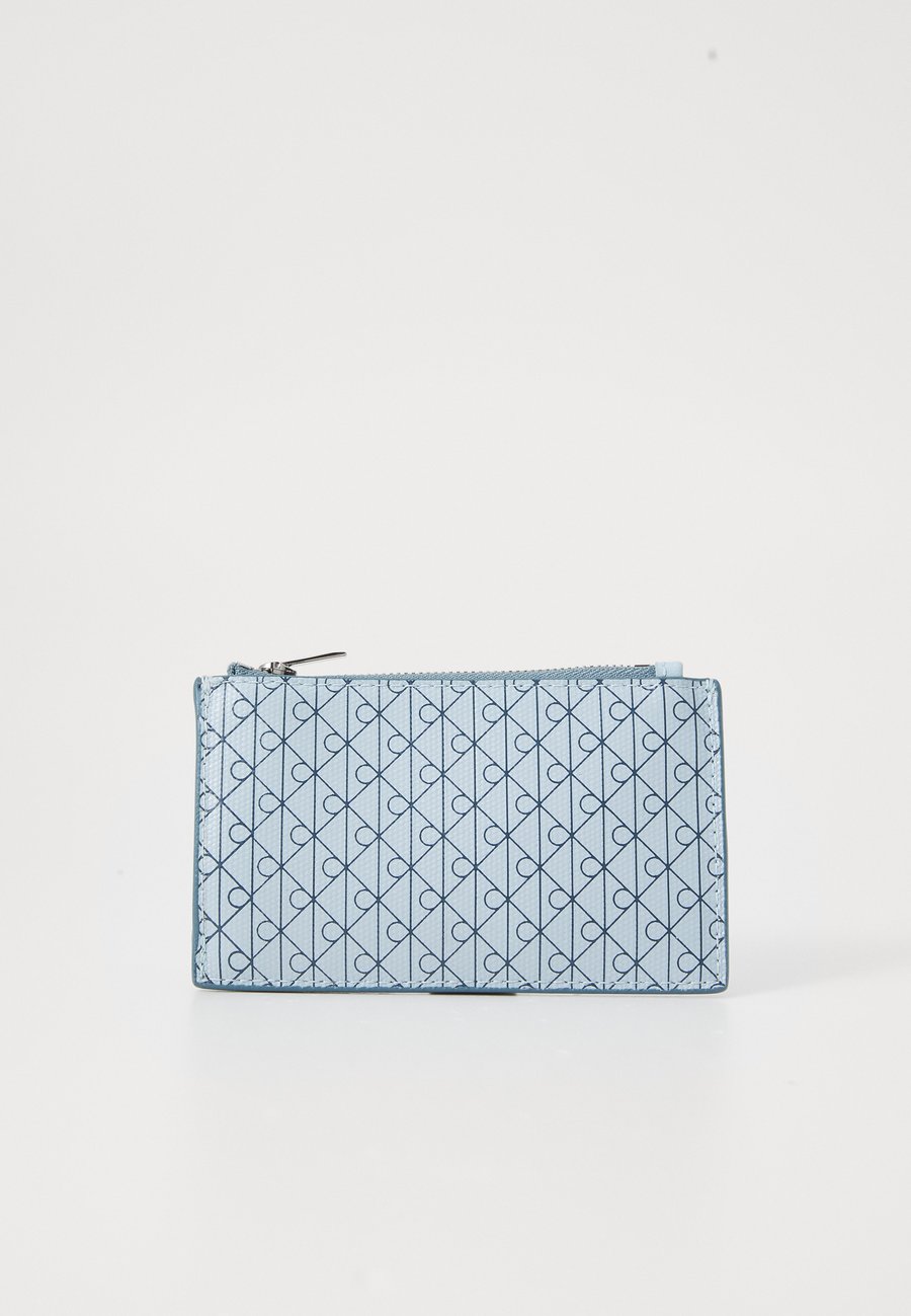 Кошелек Calvin Klein EMBLEM TOP ZIP CARDCASE, Palest Blue /Light Blue
Кошелек Calvin Klein EMBLEM TOP ZIP CARDCASE, Palest Blue /Light Blue