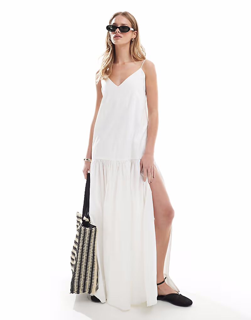 Многоярусное воздушное платье макси от Monki с завязками на спине белого цвета
Многоярусное воздушное платье макси от Monki с завязками на спине белого цвета