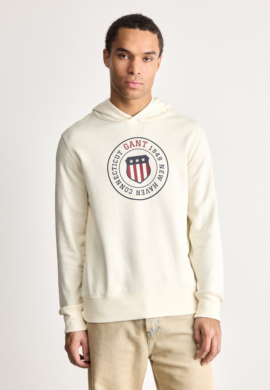 Толстовка GANT GRAPHIC HOODIE, Cream/Off-White
Толстовка GANT GRAPHIC HOODIE, Cream/Off-White
