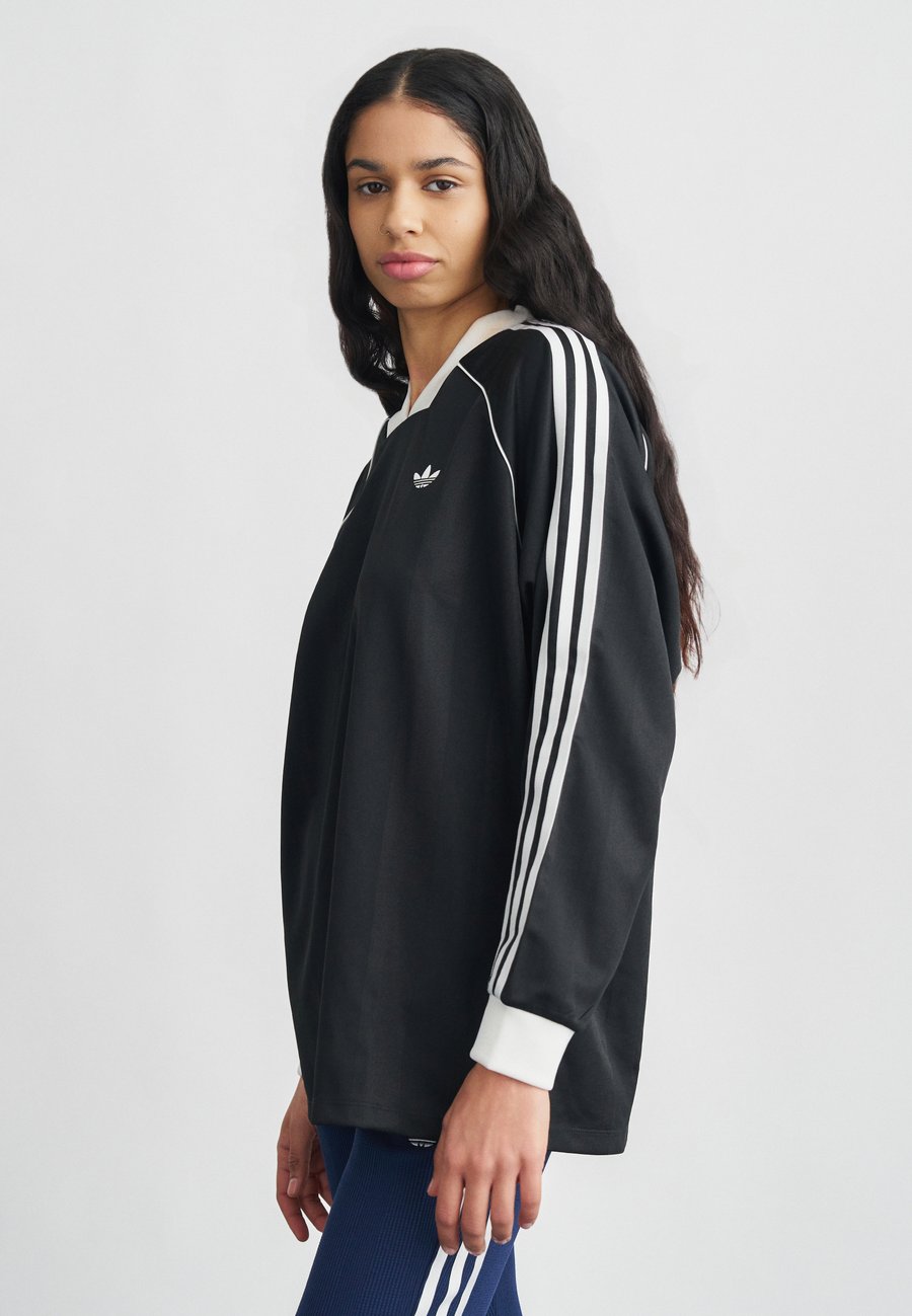 Топ Adidas Originals Long sleeved top, Black
Топ Adidas Originals Long sleeved top, Black