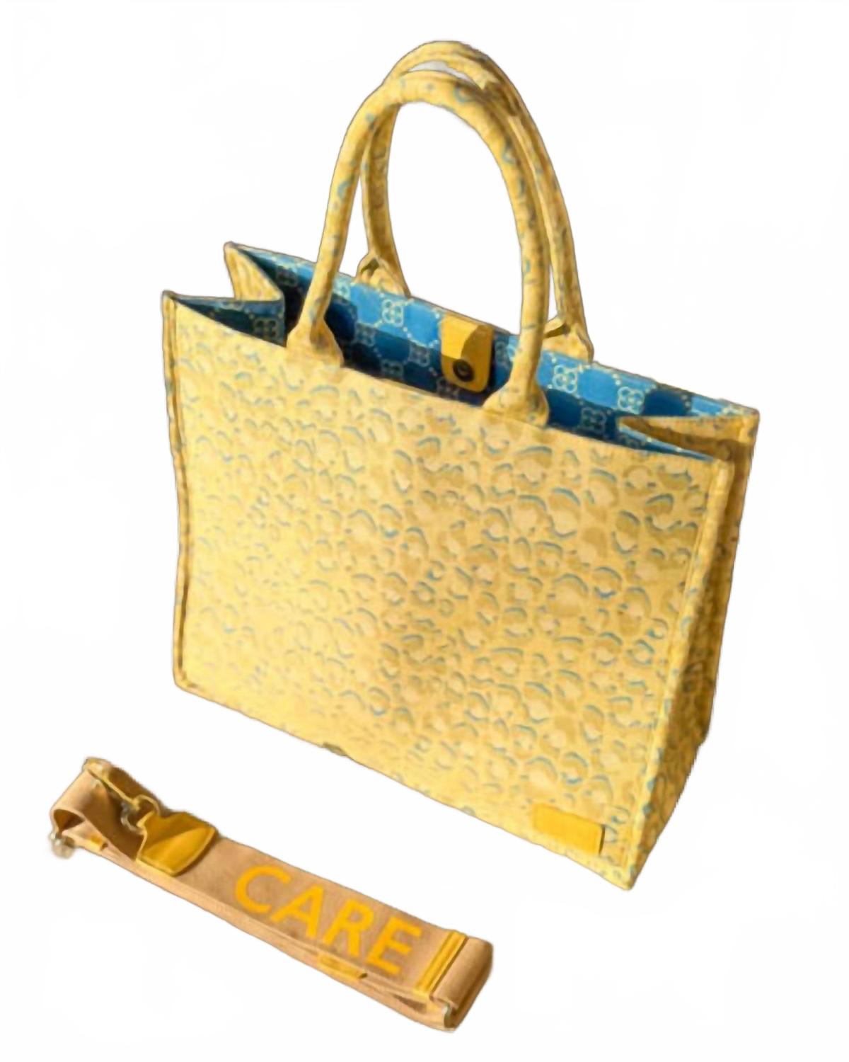Желтая сумка-шоппер в тенистом леопардовом принте Care Tucker
Желтая сумка-шоппер в тенистом леопардовом принте Care Tucker