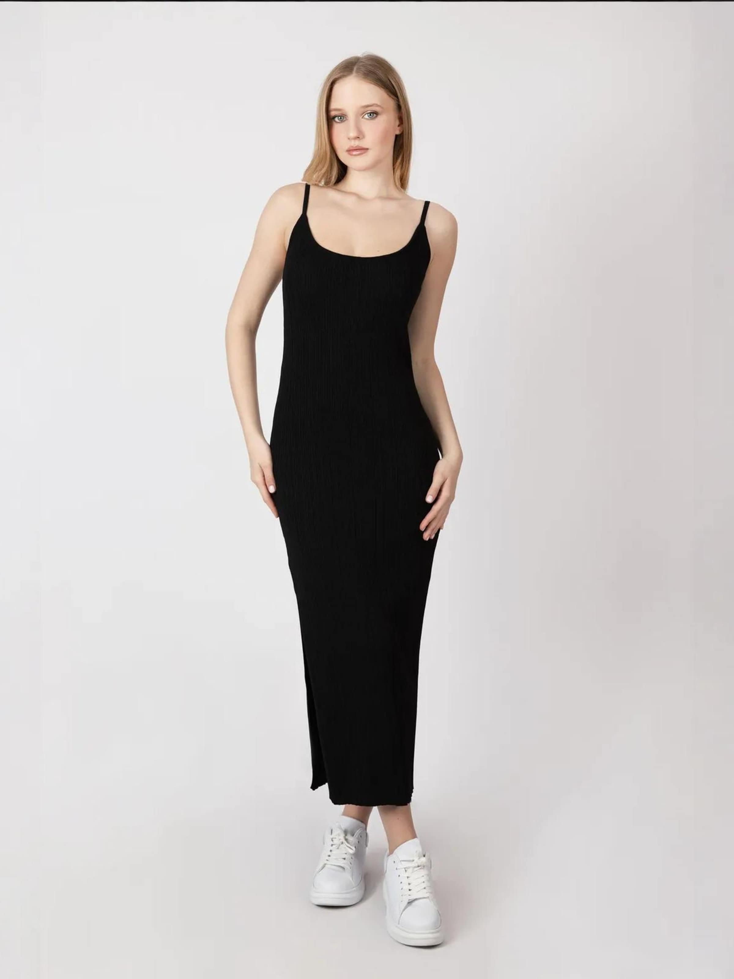 Hiccup Вязаное платье в черном цвете
Hiccup Вязаное платье в черном цвете