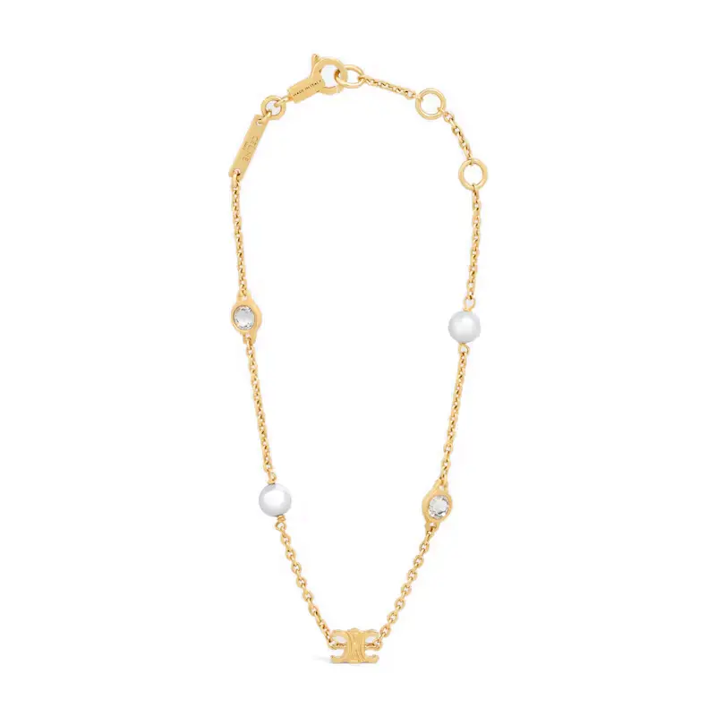 Браслет из латуни со стразами и жемчугом из смолы CELINE
Браслет из латуни со стразами и жемчугом из смолы CELINE