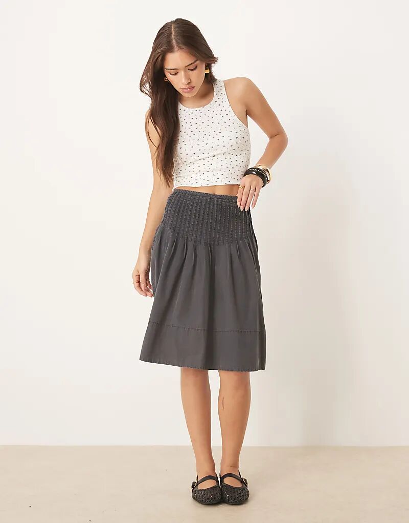 Юбка миди Free People Peyton с защипами длиной до колена, черного цвета с потертостями
Юбка миди Free People Peyton с защипами длиной до колена, черного цвета с потертостями