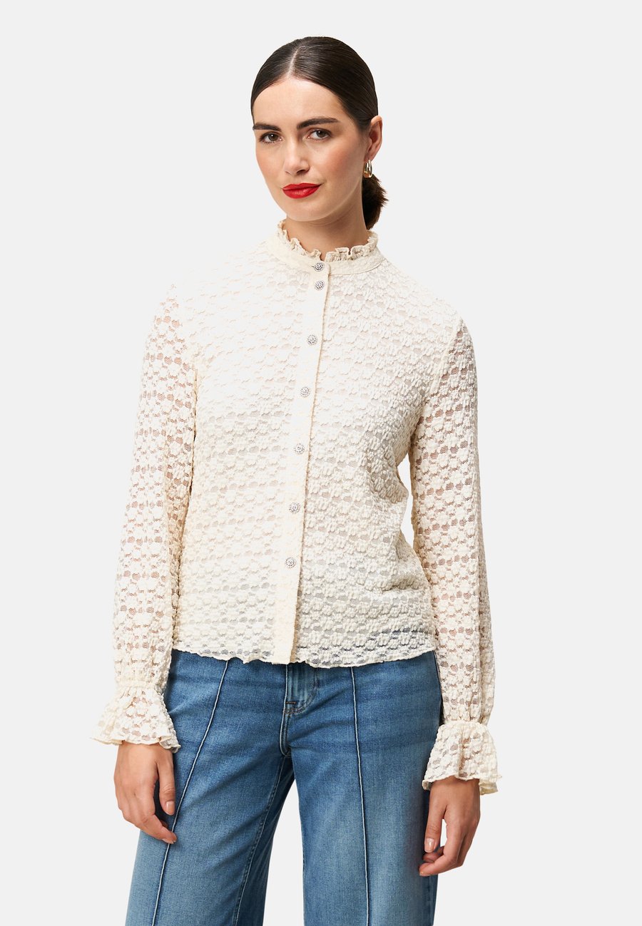 Блуза zero MIT KNOPFLEISTE, Eggnog/Beige
Блуза zero MIT KNOPFLEISTE, Eggnog/Beige