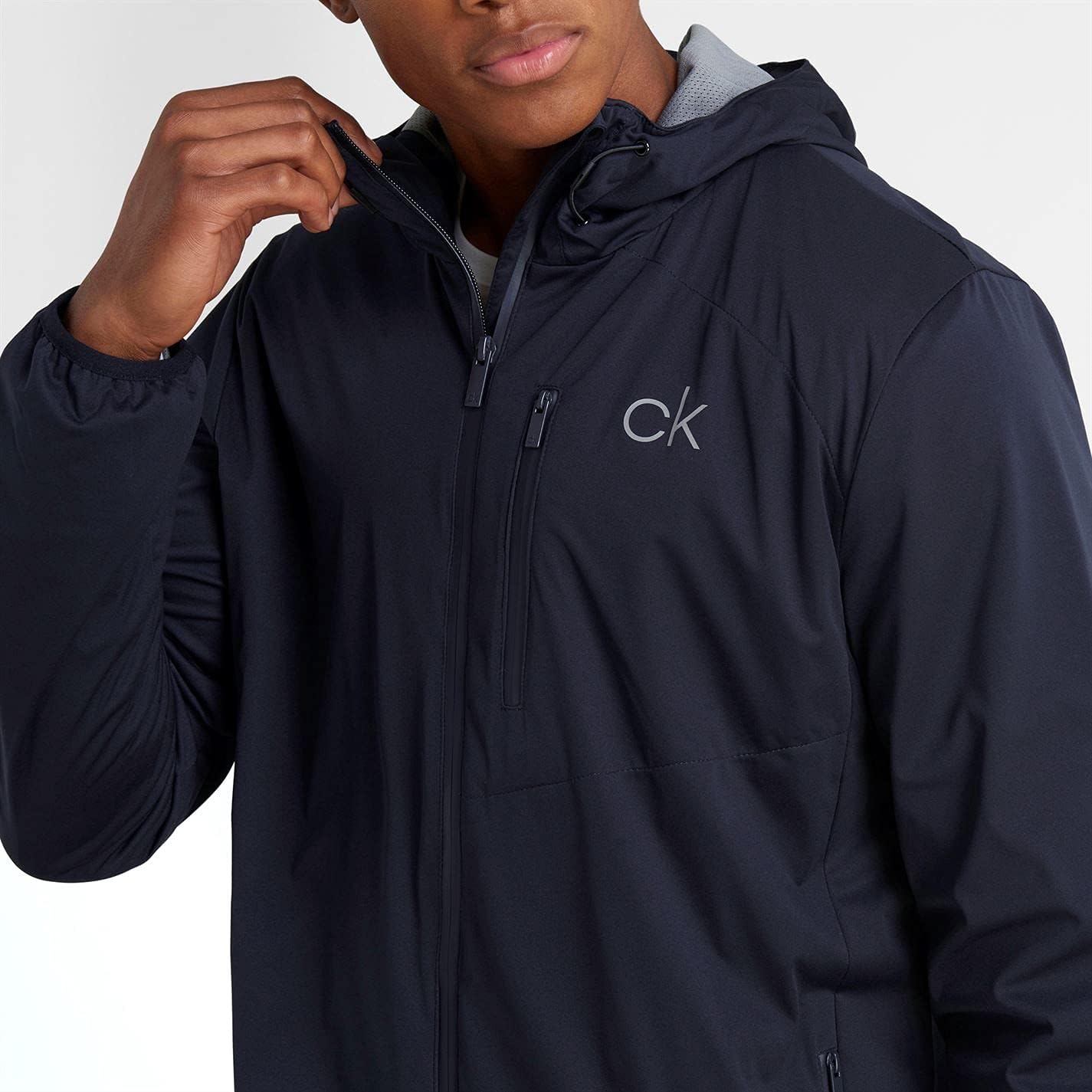 Мужская куртка для гольфа Calvin Klein Ultron с капюшоном, легкая, дышащая, эластичная, Navy
Мужская куртка для гольфа Calvin Klein Ultron с капюшоном, легкая, дышащая, эластичная, Navy