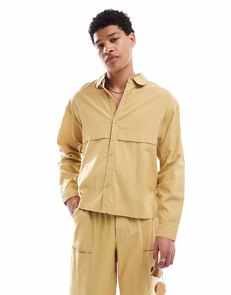 Рубашка свободного кроя из льна Native Youth цвета стираный хаки
Рубашка свободного кроя из льна Native Youth цвета стираный хаки