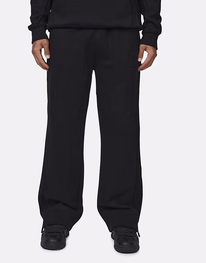 Мешковатые джоггеры с разрезами по низу черного цвета Good For Nothing
Мешковатые джоггеры с разрезами по низу черного цвета Good For Nothing